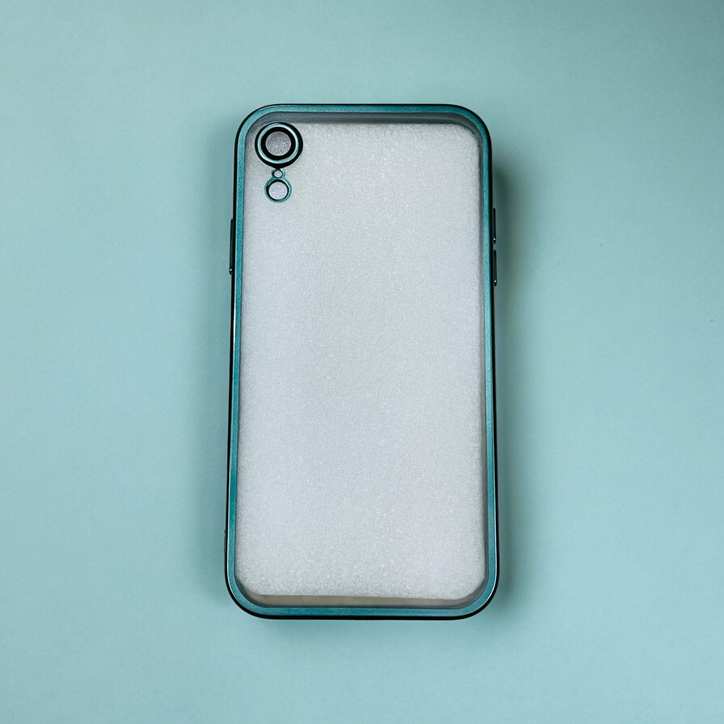 A Zivikart Elegant Electroplated Case with Camera Protection for Apple iPhone lies on a light blue surface. The case, featuring camera protection, adorns a single rear camera and a small flash positioned below the lens. Encased in durable material, the device boasts a slim profile with side buttons visible.